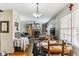 Open floorplan dining room with hardwood floors, neutral paint, and plenty of room for entertaining at 1263 Blueberry Trl, Decatur, GA 30033