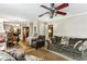Bright and spacious living room with hardwood floors, neutral paint, and a ceiling fan at 1263 Blueberry Trl, Decatur, GA 30033