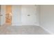 Neutral bedroom featuring a double closet with classic doors and plush carpeting at 1731 Fulmont Cir, Mableton, GA 30126