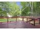 Enjoy outdoor living on this back deck overlooking the private, fenced backyard at 410 Sheringham Ct, Roswell, GA 30076