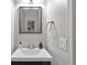 Clean and modern bathroom with a vanity, vessel sink, and stylish mirror at 410 Sheringham Ct, Roswell, GA 30076