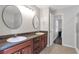 Bathroom boasts dual sinks, ample counter space and modern fixtures at 410 Sheringham Ct, Roswell, GA 30076