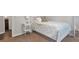 Bedroom featuring a comfortable bed, natural light, and neutral paint at 410 Sheringham Ct, Roswell, GA 30076