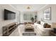 Bright living room featuring modern floors, neutral paint, and modern decor at 4203 Stratford Commons # 4203, Decatur, GA 30033
