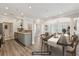 Bright living room featuring modern floors, neutral paint, and dining area at 4203 Stratford Commons # 4203, Decatur, GA 30033