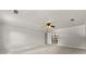 Large bedroom featuring neutral walls, plush carpet, and doorway to the bathroom at 440 Junction Trak, Roswell, GA 30075