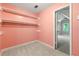 Functional closet with shelving and rod for hanging clothes at 440 Junction Trak, Roswell, GA 30075