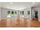 Bright living room overlooking the pool and backyard through large windows at 440 Junction Trak, Roswell, GA 30075
