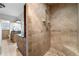 Updated shower with tile surround and bench next to vanity and mirror with great lighting at 440 Junction Trak, Roswell, GA 30075