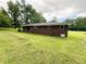Backyard featuring a well maintained lawn at 882 Campbell Rd, Covington, GA 30014