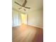 Bedroom featuring hard wood flooring and fan light at 882 Campbell Rd, Covington, GA 30014