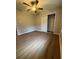 Comfortable bedroom featuring hardwood floors and a spacious closet at 882 Campbell Rd, Covington, GA 30014