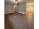 Inviting living room featuring hardwood floors, neutral colors, and natural light at 882 Campbell Rd, Covington, GA 30014
