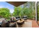 Inviting balcony featuring comfortable seating and a scenic wooded view, perfect for outdoor enjoyment at 1102 Sanders Se Ave, Atlanta, GA 30316