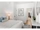 Bright bedroom with neutral decor, wood floors, and a view to the hall at 1102 Sanders Se Ave, Atlanta, GA 30316