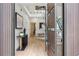 Inviting foyer with light hardwood floors and a modern wood door leading to the bright, open floor plan at 1102 Sanders Se Ave, Atlanta, GA 30316