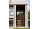 Eye-catching home entrance with a modern door and grand window providing natural light to the foyer at 1102 Sanders Se Ave, Atlanta, GA 30316