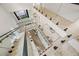Aerial view of a contemporary interior featuring an open staircase, modern lighting, and stylish living space at 1102 Sanders Se Ave, Atlanta, GA 30316