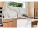 Modern kitchen featuring stone countertops, and a bright window at 1102 Sanders Se Ave, Atlanta, GA 30316