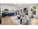 Open-concept living space featuring modern decor and large windows for natural light at 1102 Sanders Se Ave, Atlanta, GA 30316