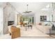 Spacious living room with marble accent wall, fireplace, and light-filled open-concept design at 1102 Sanders Se Ave, Atlanta, GA 30316