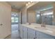 Beautiful Primary bathroom with double sink vanity and tiled shower at 568 Teversham Dr, Mcdonough, GA 30253