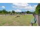 Community dog park featuring play equipment and benches at 568 Teversham Dr, Mcdonough, GA 30253