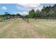 Community dog park with play equipment and green space at 568 Teversham Dr, Mcdonough, GA 30253