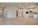 Bright kitchen featuring an island, stainless steel appliances, and ample cabinet space at 568 Teversham Dr, Mcdonough, GA 30253