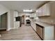 Modern kitchen featuring stainless steel appliances, granite countertops, and white cabinets at 1236 Pinedale Nw Cir, Conyers, GA 30012