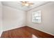 Neutral bedroom with hardwood floors and a window, providing a calm and serene atmosphere at 3149 Buford Ne Hwy # 2, Atlanta, GA 30329