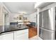 Kitchen with stainless steel refrigerator and view to the dining table at 3149 Buford Ne Hwy # 2, Atlanta, GA 30329