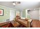 Spacious living room with hardwood floors, a comfortable couch, and easy access to other rooms at 3149 Buford Ne Hwy # 2, Atlanta, GA 30329
