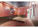 Home theater in basement features a tiered platform, wall sconces and a projector for immersive entertainment at 4046 Water Hole Ct, Douglasville, GA 30135