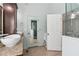 Bright bathroom with dual vessel sinks, granite countertops, and glass door shower at 4046 Water Hole Ct, Douglasville, GA 30135