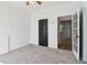 Bedroom featuring closet, open doorway and neutral carpet at 4046 Water Hole Ct, Douglasville, GA 30135