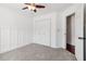 Cozy bedroom features a closet, trimwork, and plush carpeting at 4046 Water Hole Ct, Douglasville, GA 30135