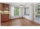 Bright breakfast nook with windows and access to the backyard at 4046 Water Hole Ct, Douglasville, GA 30135