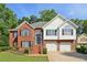 Beautiful two-story house with brick facade, black shutters, and manicured landscaping at 4046 Water Hole Ct, Douglasville, GA 30135