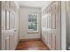 Hallway with ample closet space and wood floors at 4046 Water Hole Ct, Douglasville, GA 30135