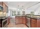 Kitchen with stainless steel appliances, granite countertops, and wood cabinets at 4046 Water Hole Ct, Douglasville, GA 30135