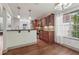 Bright kitchen with stainless steel appliances, granite counters, and warm wood cabinetry at 4046 Water Hole Ct, Douglasville, GA 30135