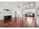 Spacious living room featuring high ceilings, hardwood floors, and modern fixtures at 4046 Water Hole Ct, Douglasville, GA 30135
