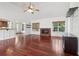 Spacious living room with hardwood floors, a fireplace, and an open concept layout at 4046 Water Hole Ct, Douglasville, GA 30135