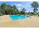 Community pool has a relaxing view of the lake with plenty of space to enjoy the outdoors at 4046 Water Hole Ct, Douglasville, GA 30135