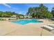Community pool featuring lounge chairs for relaxation on a sunny day at 4046 Water Hole Ct, Douglasville, GA 30135