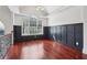 Sitting area with a large window and decorative wall paneling at 4046 Water Hole Ct, Douglasville, GA 30135