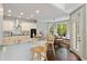 Well-equipped kitchen with granite countertops, stainless steel appliances, and breakfast bar seating at 5007 Highland Oaks Se Ct, Smyrna, GA 30126