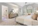 Spacious main bedroom boasts vaulted ceilings, a large window, and an open entrance to the ensuite bathroom at 5007 Highland Oaks Se Ct, Smyrna, GA 30126