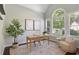 Inviting home office with natural light, modern decor, and ample workspace at 5007 Highland Oaks Se Ct, Smyrna, GA 30126